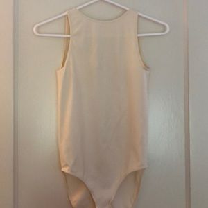 Cream Free People bodysuit. Size XS/S